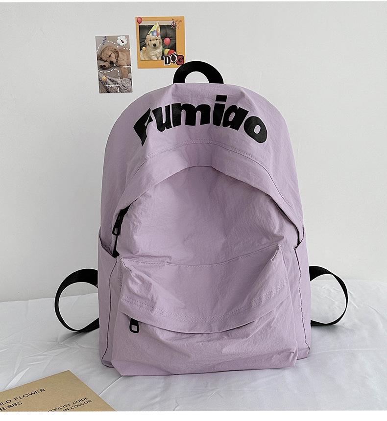 Lightweight Minimalist Backpack for Female Students: Versatile Double-Shoulder Bag for School and Travel.