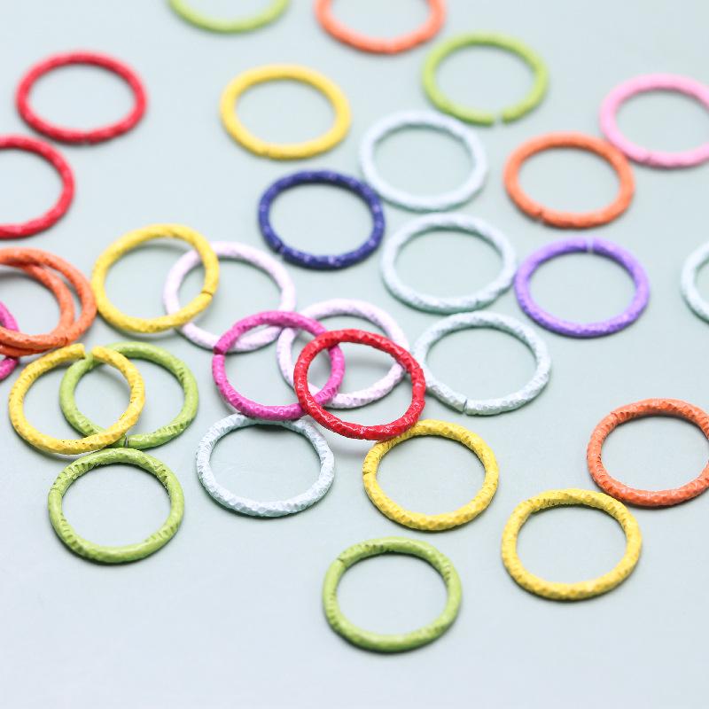 DIY Jewelry Accessories: Colored Baking Paint Embossed Rings (2,000/pack), featuring Round, Open, Single, and Twisted Flower Designs.