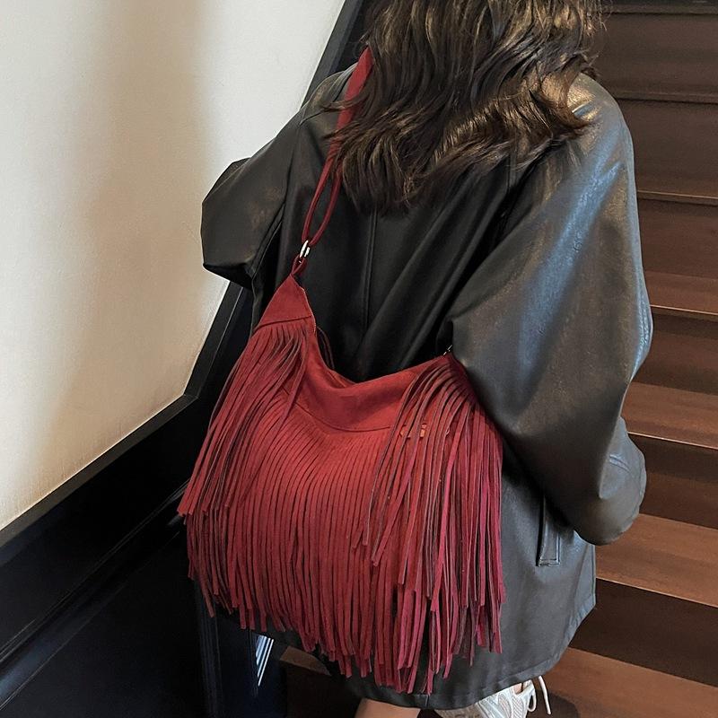 Wysokiej klasy tekstura, modna i retro torebka damska z frędzlami, niszowa matowa torba do noszenia w ręku