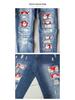 Women's Ripped Straight Leg Jeans with Santa Claus Patches - 2025 New Style
