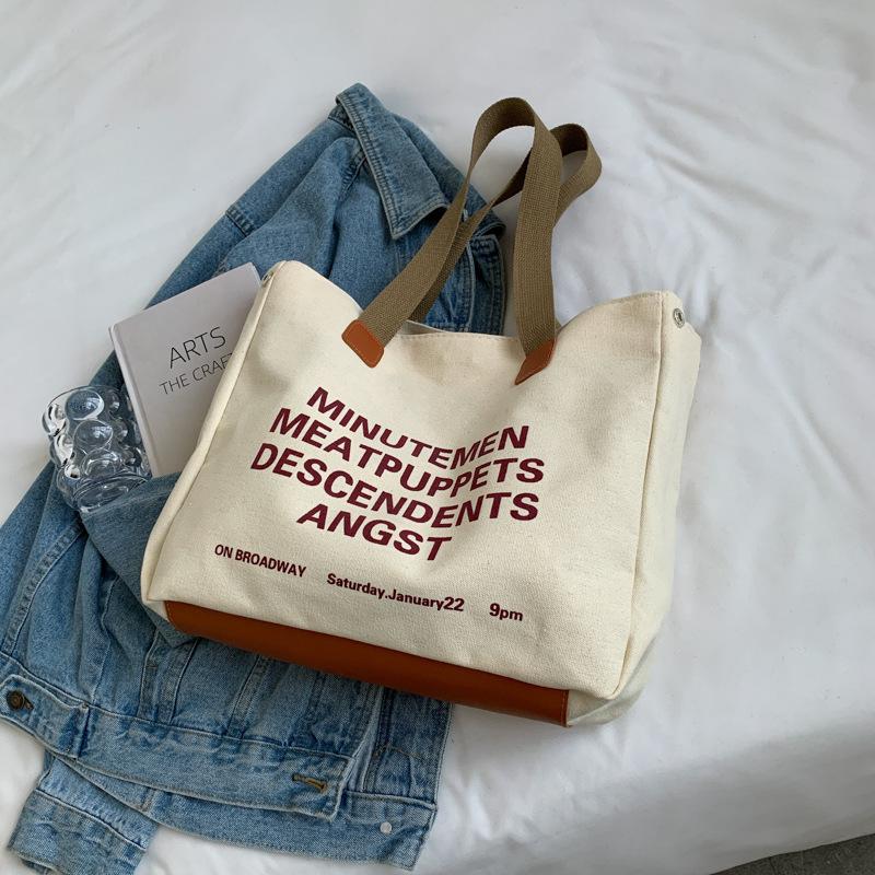 

Niche canvas bag women s 2025 new shoulder bag hand bag underarm bag travel handbag bag