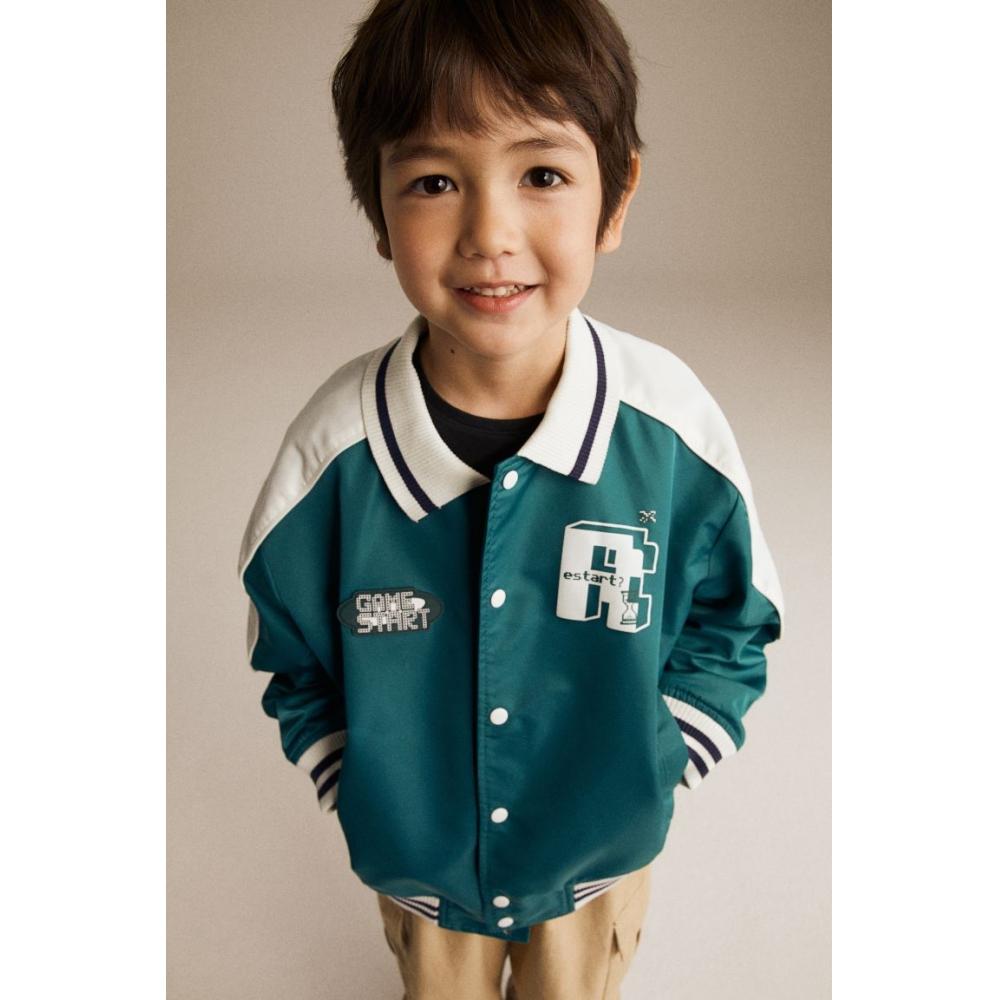 

Куртка-бомбер HM с атласным воротником Темно-бирюзовая с цветными блоками