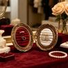 Ring Display Tray with Multiple Horizontal Slots, Ornate Oval Scrollwork Frame and Flat Base for Tabletop Presentation