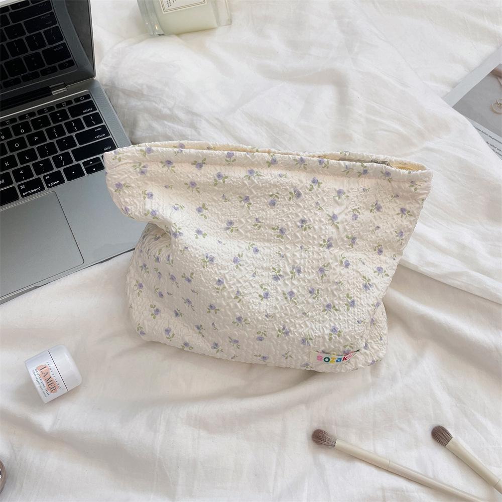 Embossed Cartoon Cosmetic Bag - Portable, Large Capacity Travel Toiletries & Skin Care Storage Bag.