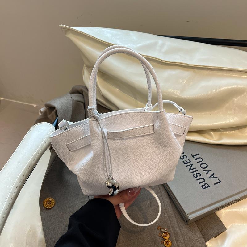 

Korean version of retro portable bucket bag women s 2025 summer new light foreign-grade texture casual shoulder messenger bag белый