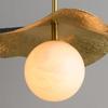 Simple and modern light luxury brass marble ball pendant light, Chinese creative copper art lotus leaf pendant light