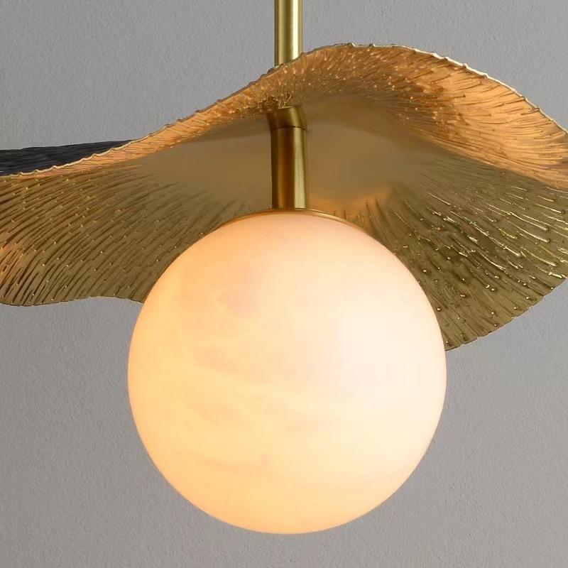 Simple and modern light luxury brass marble ball pendant light, Chinese creative copper art lotus leaf pendant light