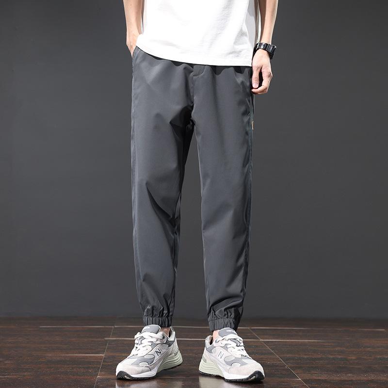 Men's Spring/Summer Ice Silk Sports Pants - Versatile, Comfortable, Breathable, Loose-Fit Casual Style.