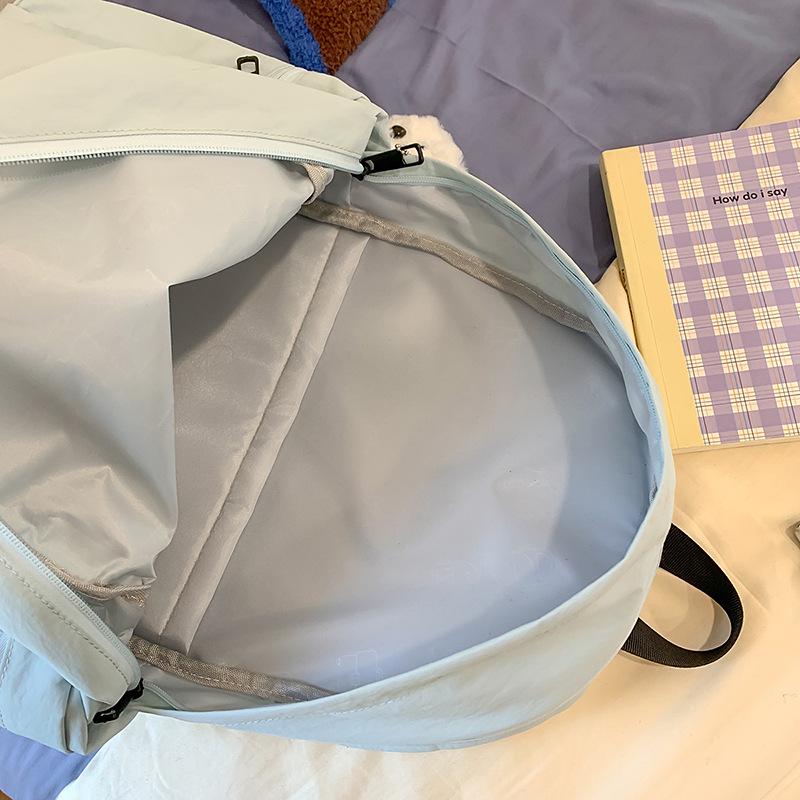 School bag Japanese simple solid color backpack light commuting large capacity student school bag casual versatile outdoor travel backpack