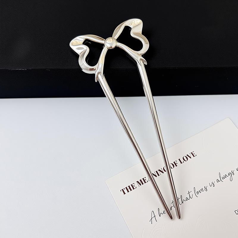 Barrette nœud tendance 2024: Accessoire pour cheveux pour femmes de style simple