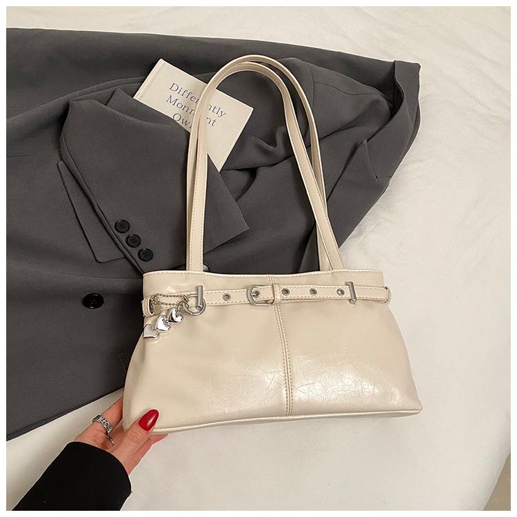 

Мода 2025 Новая весенняя сумка под мышкой Премиальный стиль Spice Girl Нишевый дизайн Сумка через плечо для профессионалов белый