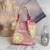 Versatile Large Knitted Handbag with Hollow-Out Flower Pattern