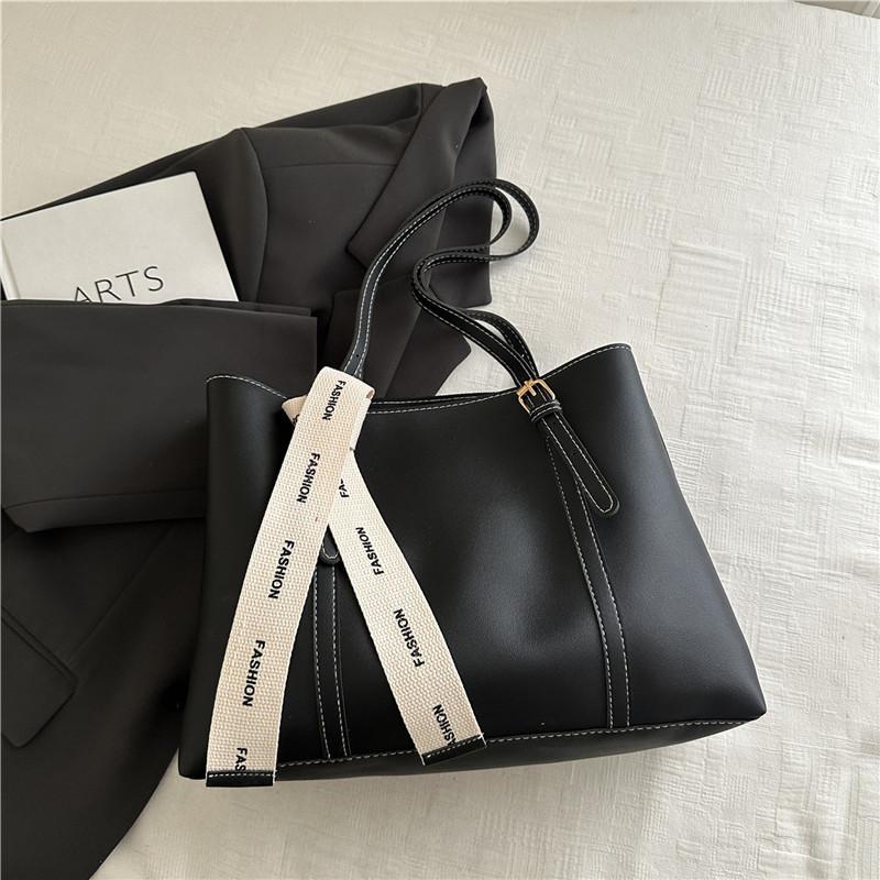 

Large capacity bag 2025 new simple solid color women s bag fashionable commuter shoulder bag college student class support bag
