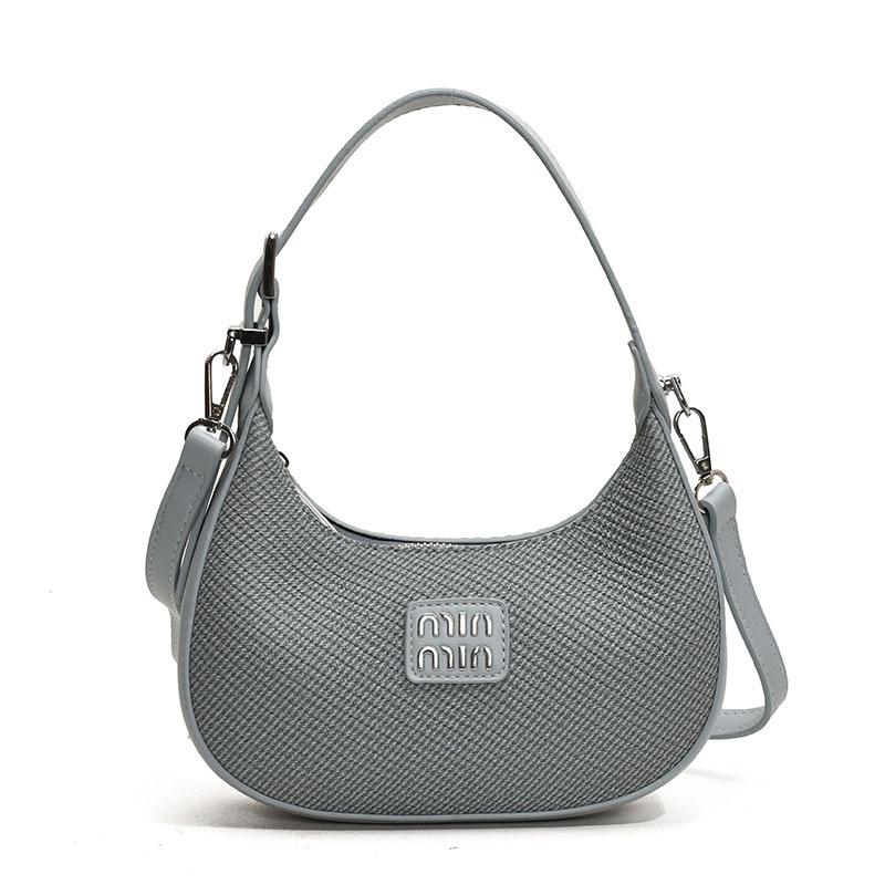 

2025 new Korean version of simple temperament underarm portable crescent bag versatile commuter niche casual women s messenger bag
