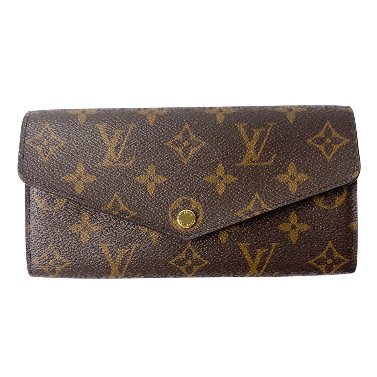 

Вживаний гаманець LOUIS VUITTON Коричневий ПВХ Жіночий