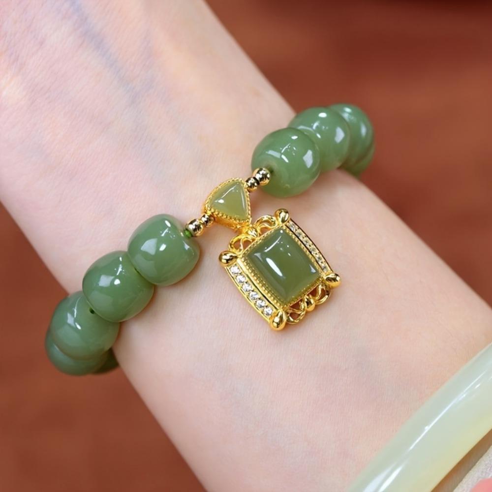

Elegant Jade Bracelet. Retro design with pendant, a luxurious holiday gift for women.