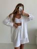 Moda primaverile europea e americana transfrontaliera set di camicia a tinta unita monopetto a maniche lunghe nuova ampia e pantaloncini casual