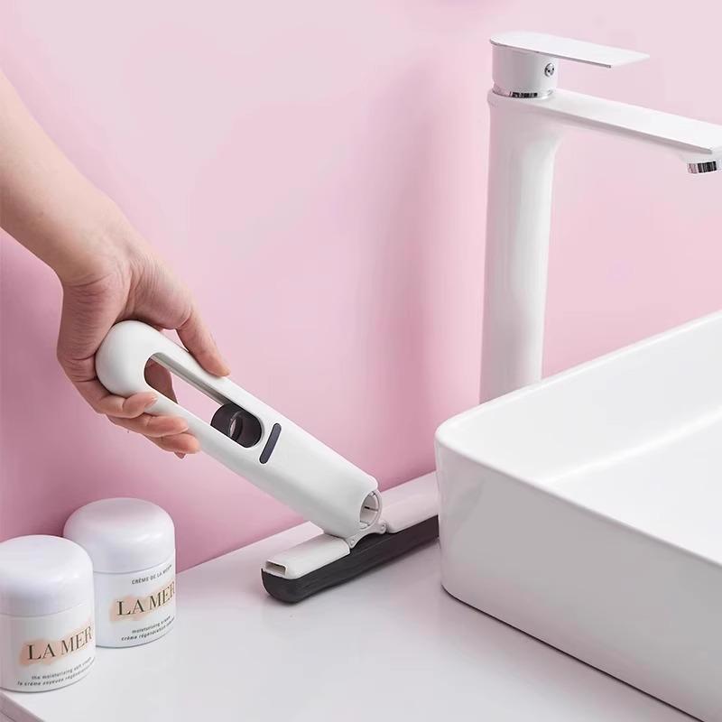 2025 Multifunctional Mini Desktop Mop with Hand-Free Wash Sponge Replacement.