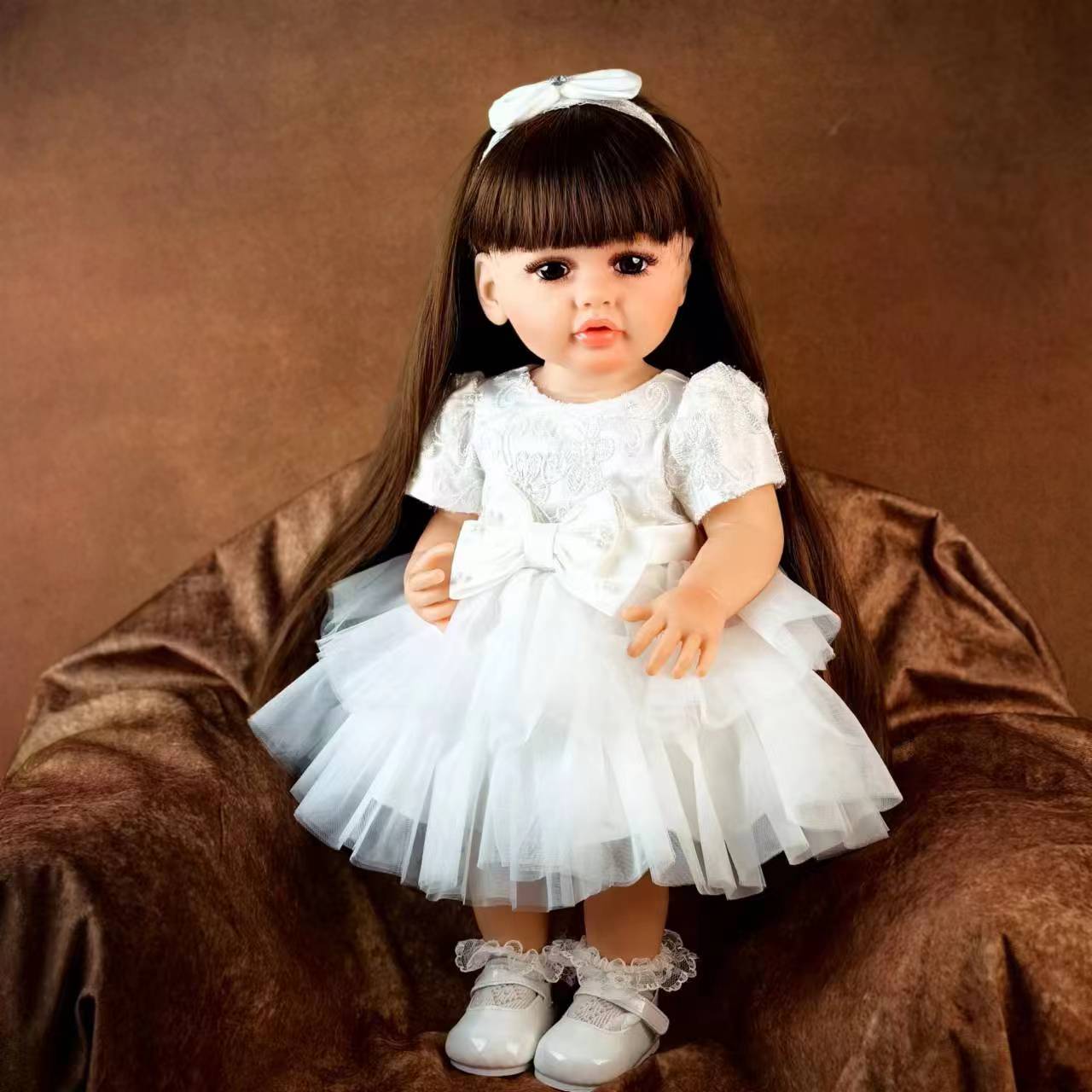 

KEIUMI Силикон-виниловая кукла реборн 55 см девочка реалистичная длинные волосы принцесса Бебе кукла новорожденная для детей подарки на день рождения Пасху 22 inch about 55 cm коричневый