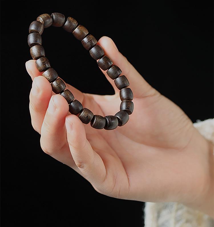 Agarwood Black Qinan High Oil Sinking Bracelet: 108 Bead Buddhist Rosary with Round and Barrel Beads, High-Quality Woody Hand Jewelry.