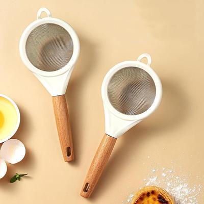 Tamiz de harina de acero inoxidable, azúcar en polvo, jugo, leche de soja, filtro de espuma, pantalla fina, mango de madera, utensilios de horneado para cocina en casa