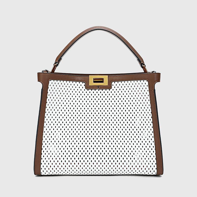 

Autumn and summer new leisure large-capacity cowhide hollow color matching women s portable messenger kitten bag genuine leather