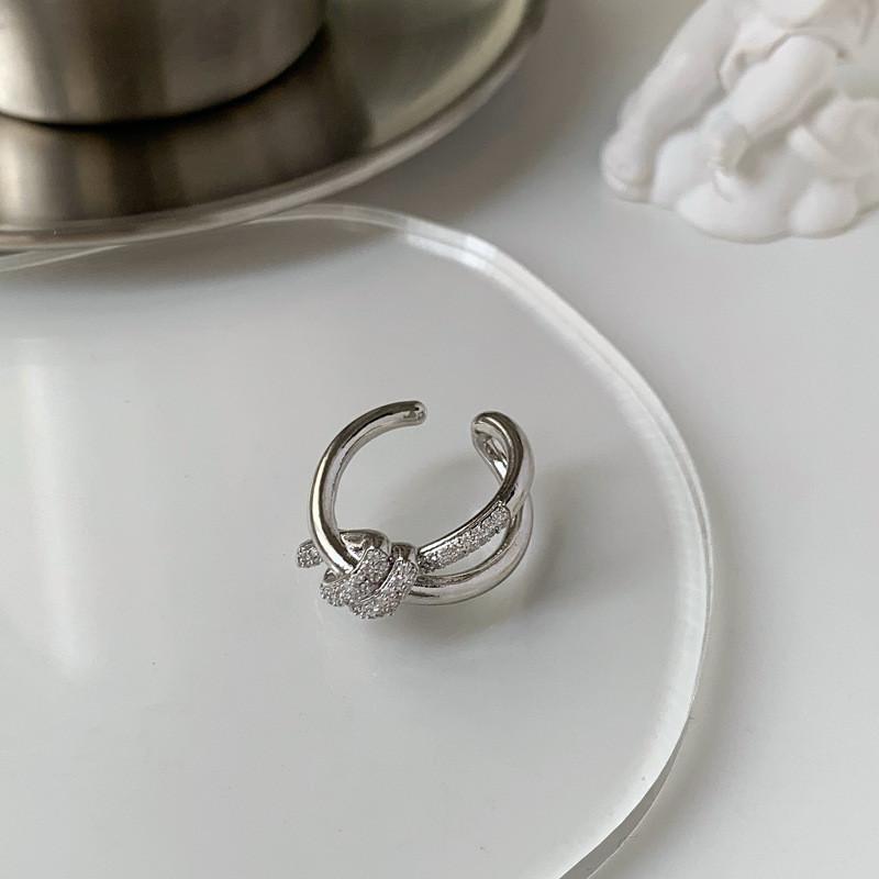 

Daring Knot Irregular Ring In White Gold Finish With Geometric Shapes And Details Stunning