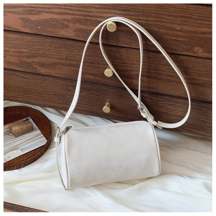 

2025 spring new Korean niche high-end fashion cylinder bag women s handheld underarm bag shoulder messenger bag