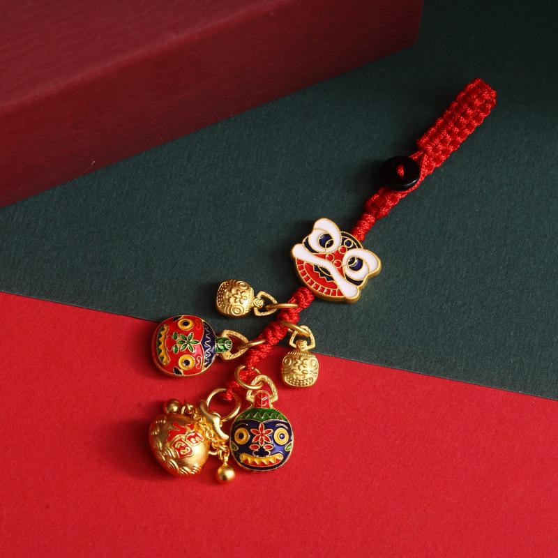 Goldener Glücksschlüsselanhänger: Reichtumsgott verschlingt Goldtier für Familie, perfekt als Auto- oder Handyanhänger.