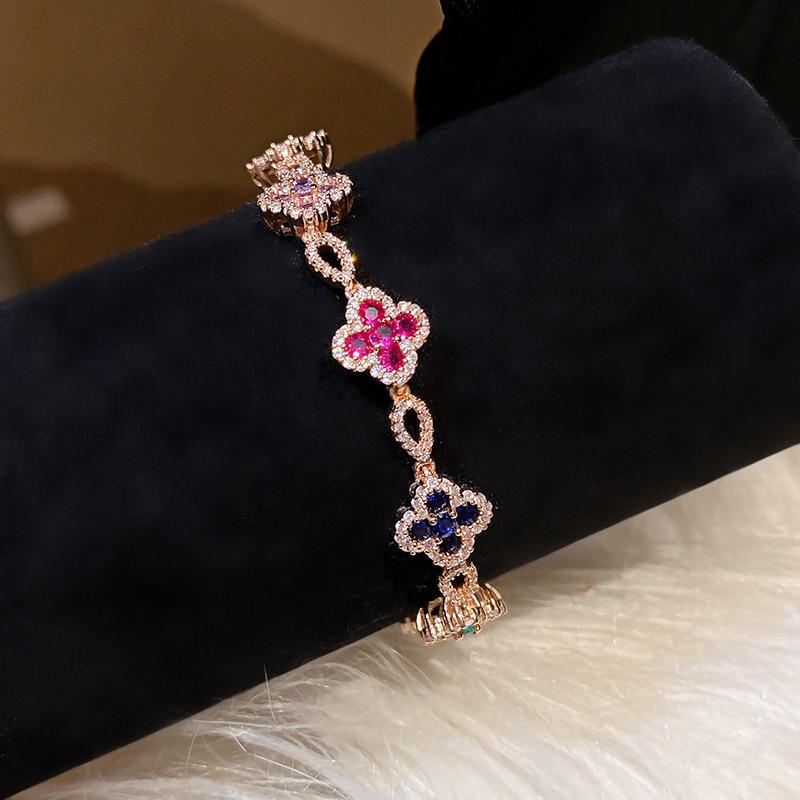 Pink Diamond Zirconia Starburst Flower Bracelet: Trendy, Luxurious Jewelry with Unique Design.