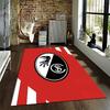 Red and Black Oval Crest Design suitable as a non-slip mat for the living room or bedroom sofa