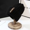 Women's Korean Fashion Knitted Hat with Ribbed Pattern and Ear Protection