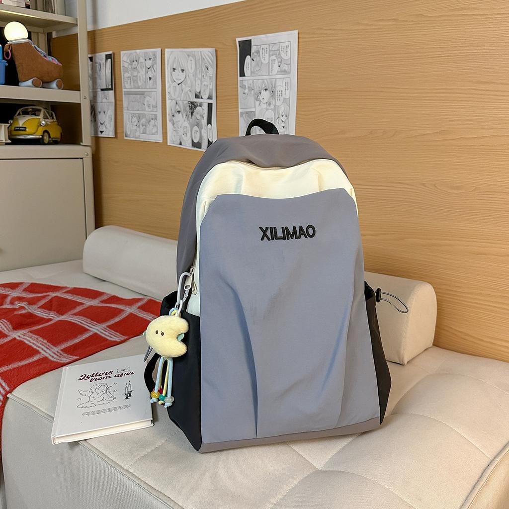 Schoolbag large-capacity contrasting color student schoolbag 1011 winter new trendy Korean version fashion travel lightweight high-value backpack