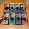 Applicable to Samsung S26Ultra mobile phone case, rhinestone glitter powder, magnetic mirror bracket S25 anti-drop soft case A56