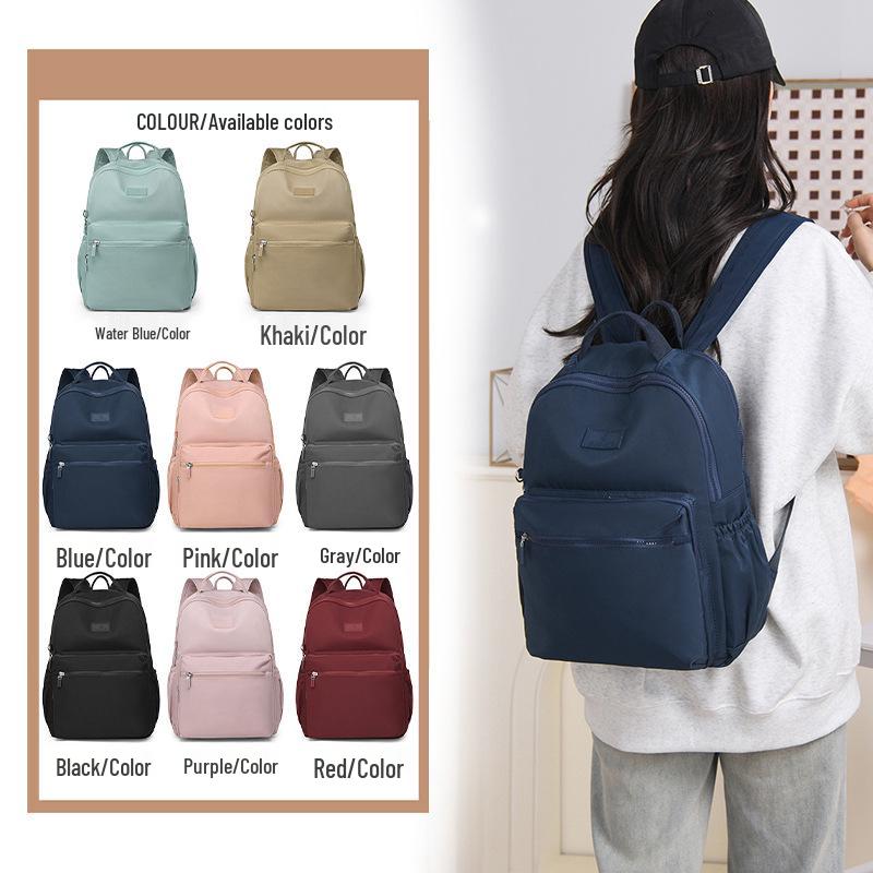 Large Capacity Unisex Splash-Proof Nylon Backpack: Travel, Casual, Fashionable, Suitcase Handle Compatible, School Bag