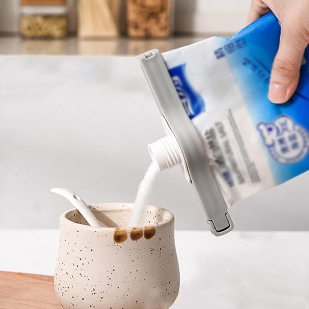 Verschlussklemme mit zweiteiligem Gewürzaufbewahrungsdeckel