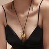 Qiong Yao Stainless Steel Curved Pendant Necklace with Black Leather Cord, Adjustable Length, Simple High-End Design for Women.