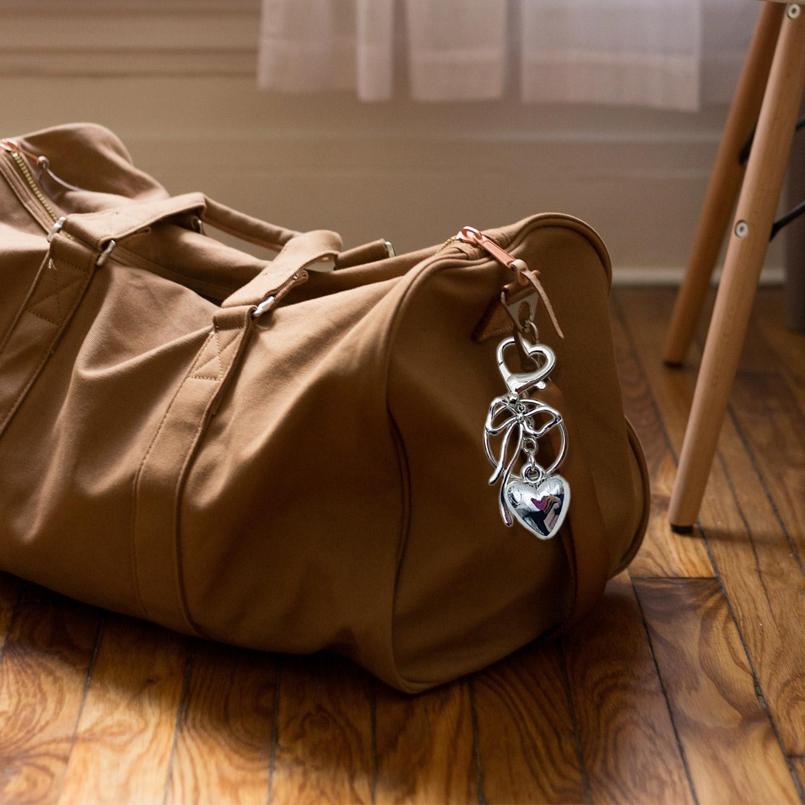 Элегантный кулон в виде сердца с бантом — фото 3