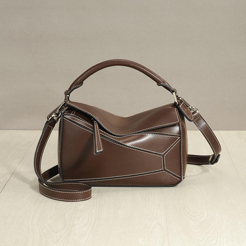 Tendência 2024: Bolsa Transversal Feminina de Couro Genuíno com Costura Geométrica Xi Mengyao - Bolsa Travesseiro Grande