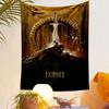 A sword piercing a glowing doorway with a figure atop a rocky hill. Patterned tapestry for bedroom and living room home decor