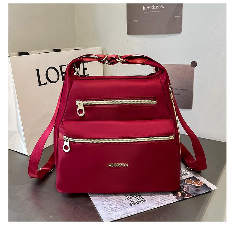 

Нейлонова жіноча сумка, модний багатоцільовий рюкзак через плече, жіночий рюкзак великої місткості, легкий дорожній рюкзак. бордовий