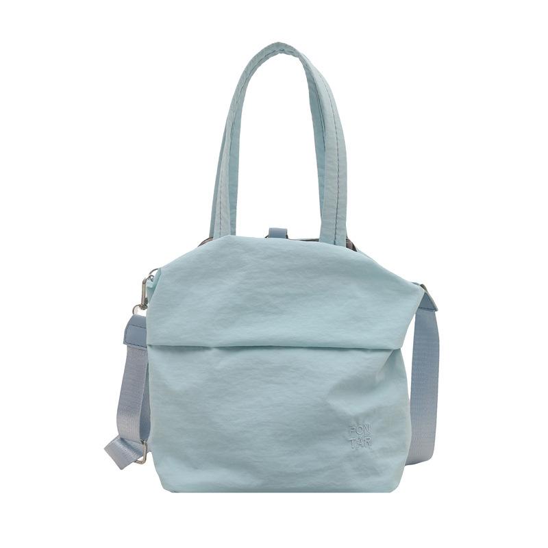 Fresh and sweet girl simple casual going out large capacity solid color spring hand carry shoulder small messenger bag
