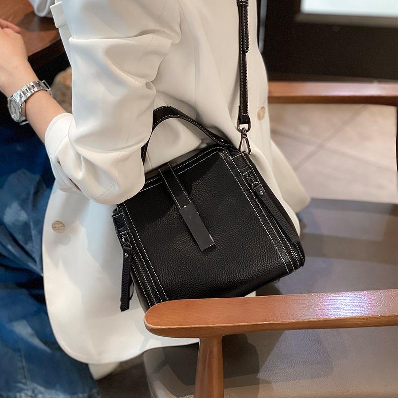 

Cowhide bag women s new leather women s bag shoulder bag niche design portable messenger bag чёрный