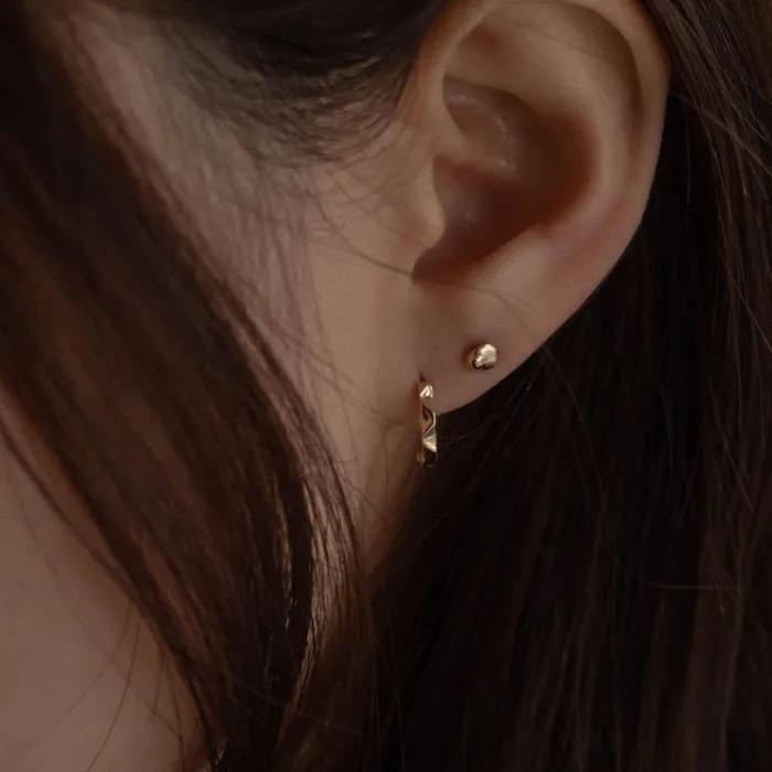14k gravel piercing