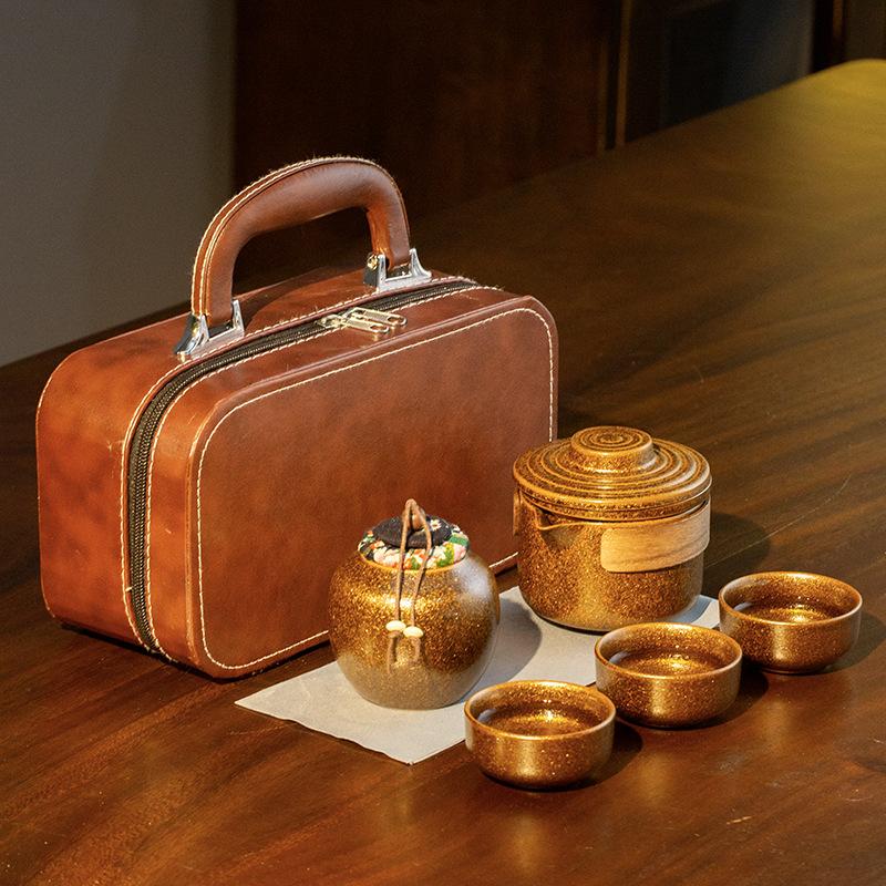 

Kiln change leather bag travel tea set Kuaike cup set outdoor tea making portable one pot three cups business gifts