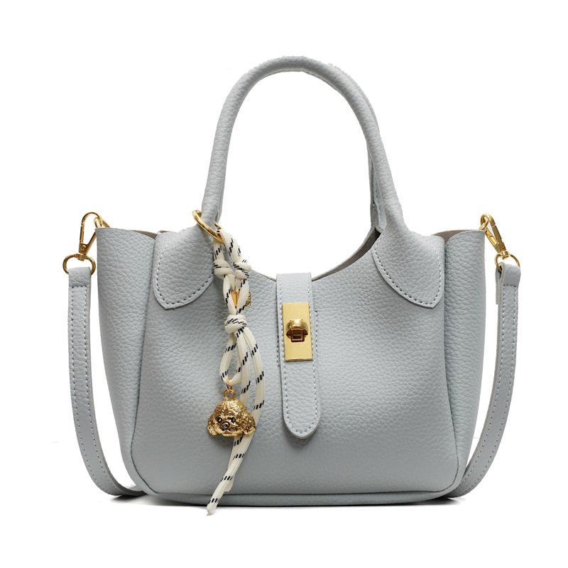 Korean version of trend temperament light luxury lychee pattern portable bucket bag women commute to work simple advanced sense messenger bag bag