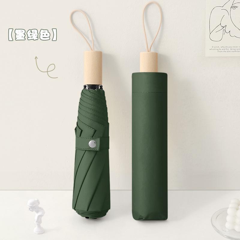 New three-fold simple plain color windproof and sun protection creative solid wood handle female vinyl parasol
