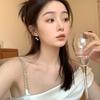 Design High-end Bow Love Pearl Fringed Earrings Light Luxury Niche Stud Earrings Women's Ear Clips