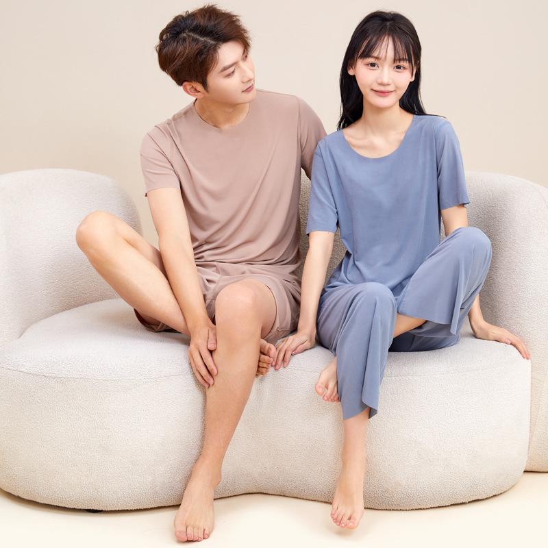 Couple's Ice Silk Pajamas Set: Men's Thin Sleep Pants & Women's Ribbed Short Sleeve Top for Spring/Summer.