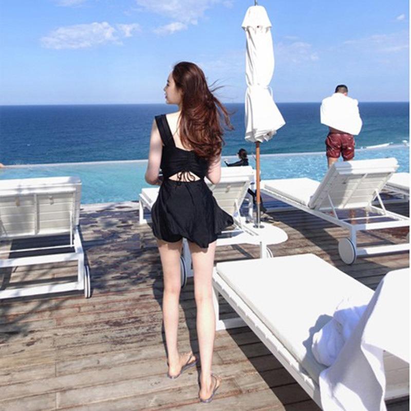 

Новый купальник женский консервативный раздельный купальник слим живот купальник горячий источник юбка купальник модный и сексуальный XL чёрный